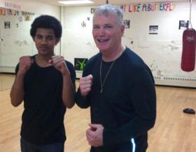 St. Peter's Boxing duo: Boxing coach and former DEA agent Paul Doyle, right, with 15 year-old Jose Pires. Photo by Eoin Cannon